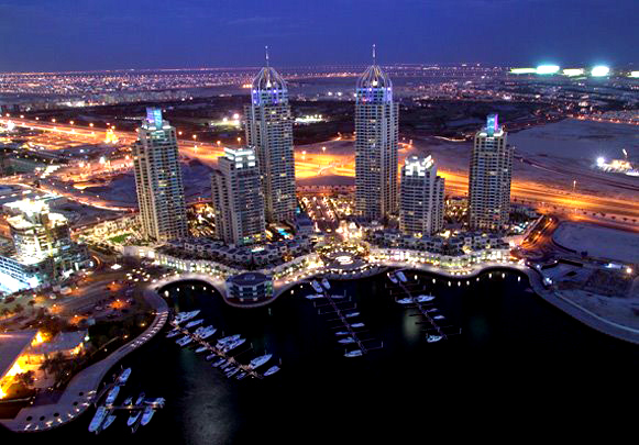 Dubai Marina, a man-made development, will have over 200 highrise bldgs and will be home to some of the tallest residential structures in world.  It will be completed by 2010.